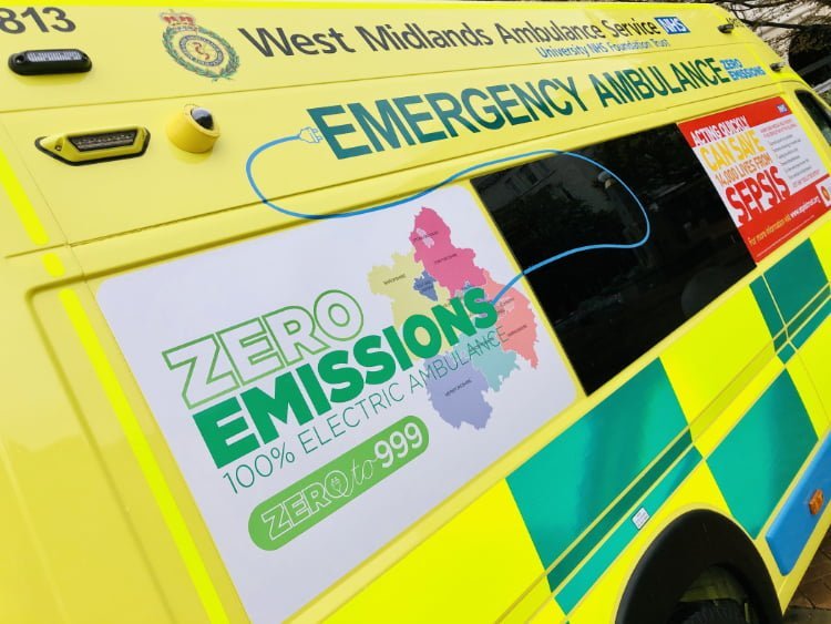 The photo shows the side of an electric ambulance.