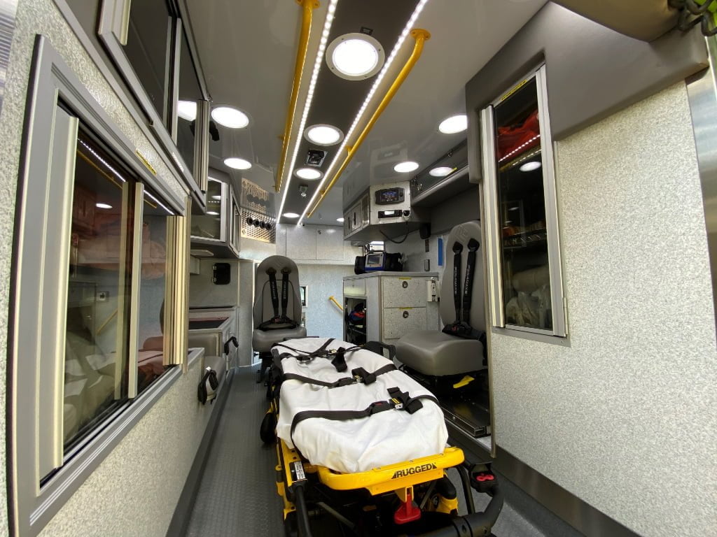 The new Lexington County EMS rigs have a Stryker Power-LOAD cot in the center of the patient module, and IMMI Per4Max four point harness systems on all the seating.