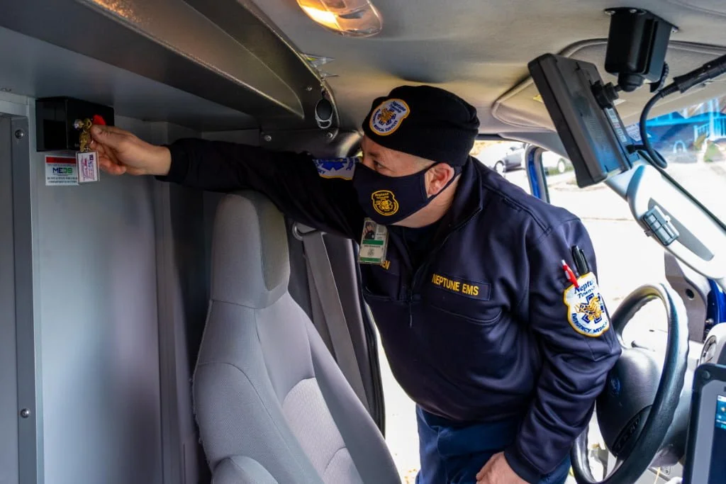 Neptune Township EMS manager Bil Rosen operates the new MEDS decontamination unit. 