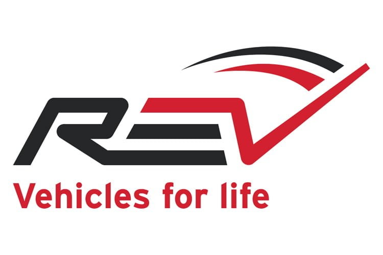 The photo shows the REV Group logo.