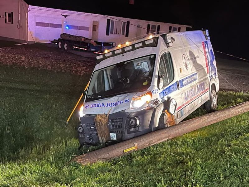 Three Trapped after ME Ambulance Slams into Utility Pole