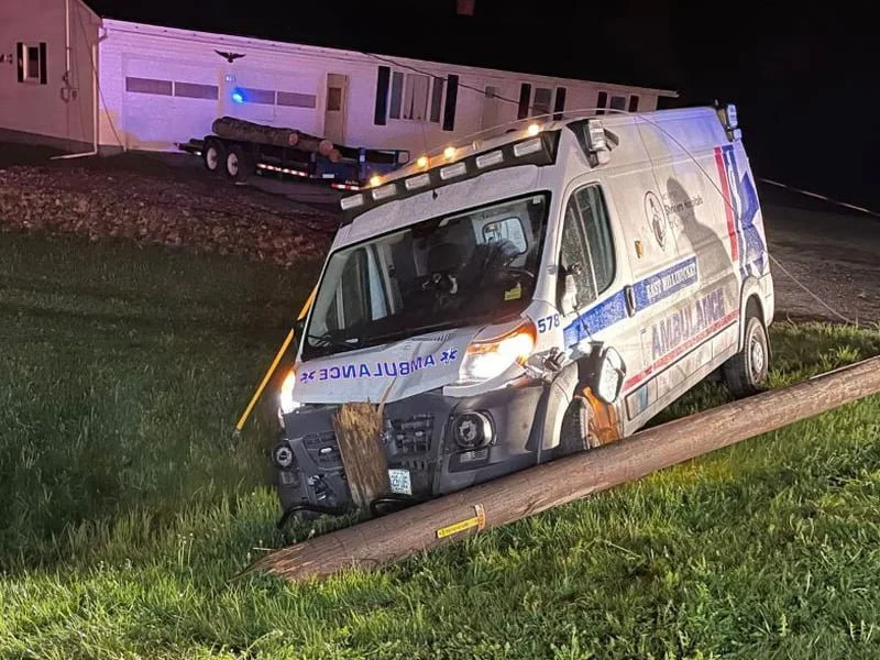 An East Millinocket Ambulance is shown with damage to the hood after slamming into a utility pole.