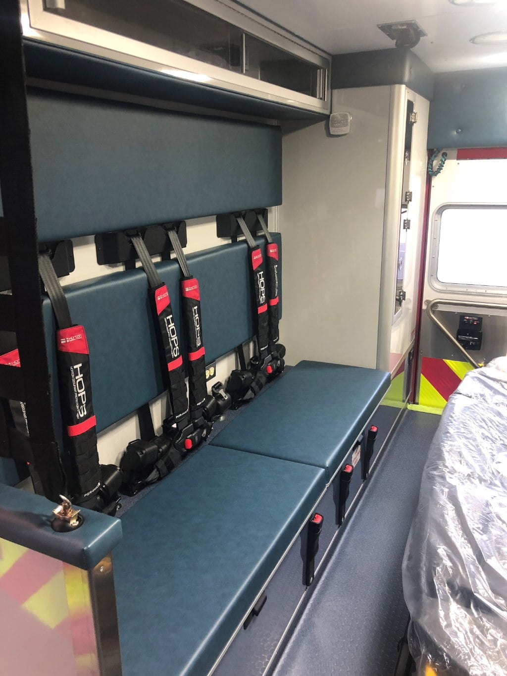 The squad bench area on the new Horton ambulance for North Andover. The ambulance has the Horton Occupant Protection System, which includes Per4Max four-point harness on all seating positions.
