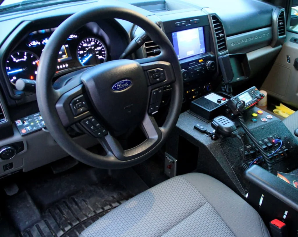 The driver's position in the cab of the new rig.