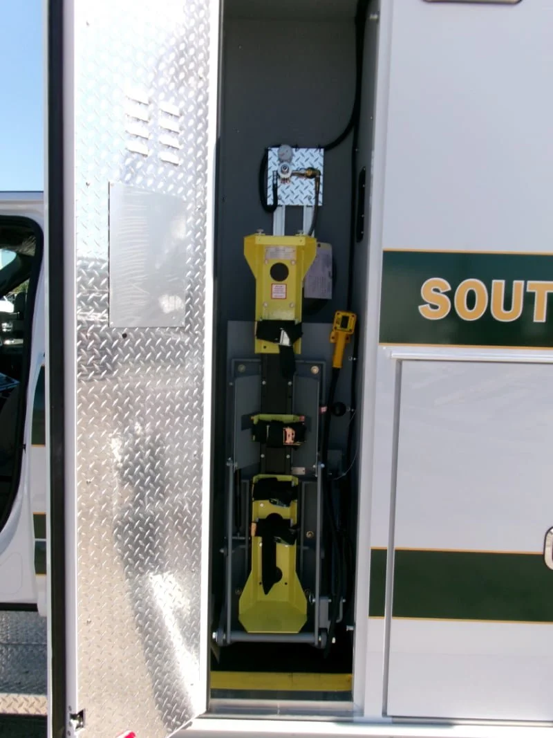 Street side compartment one holds a Zico OTS electric oxygen bottle lift.